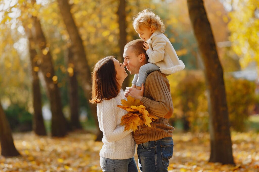 A family enjoying a beautiful day outdoors, reflecting joy in pursuing God’s purpose together