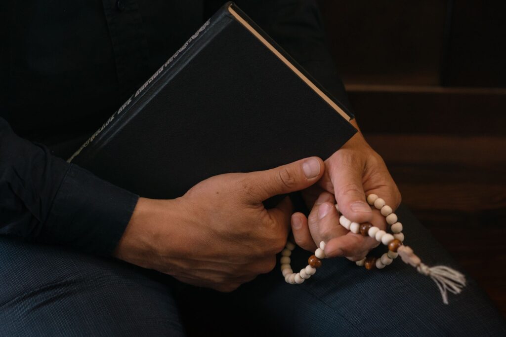Hands clasped in prayer reflect the deep trust and reliance on God during life's challenges